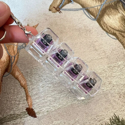 Llavero Fidget con 4 Teclas y Luz - Juguete Antiestres Relajante Adultos