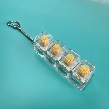 Llavero Fidget con 4 Teclas y Luz - Juguete Antiestres Relajante Adultos