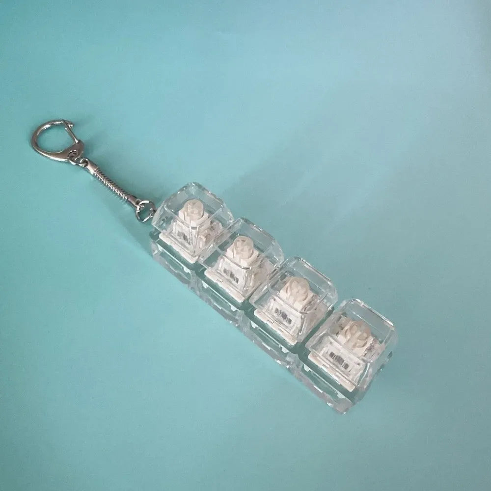 Llavero Fidget con 4 Teclas y Luz - Juguete Antiestres Relajante Adultos